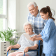 Nurse talking with couple in home, Pemi-Baker Hospice & Home Health, Plymouth, NH