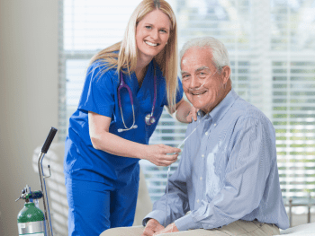 Nurse helping COPD patient, Pemi-Baker Hospice & HOme Health, Plymouth, NH